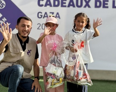 Children celebrating Eid with gifts in Gaza