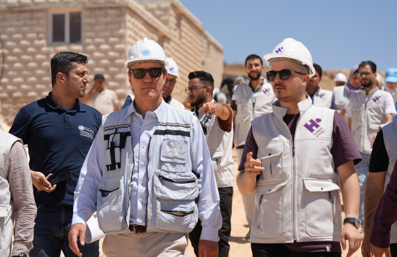 UN Deputy Regional Humanitarian Coordinator David Carden (left), visiting Al Yasameen Town for IDPs in northwest Syria with Dr. Ubeyd Sakin (right), Human Appeal’s Country Director for Turkey & Syria.